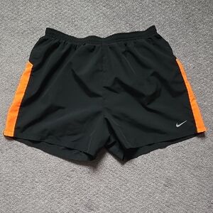 Nike Men’s Black Athletic Shorts with Orange Side Panels